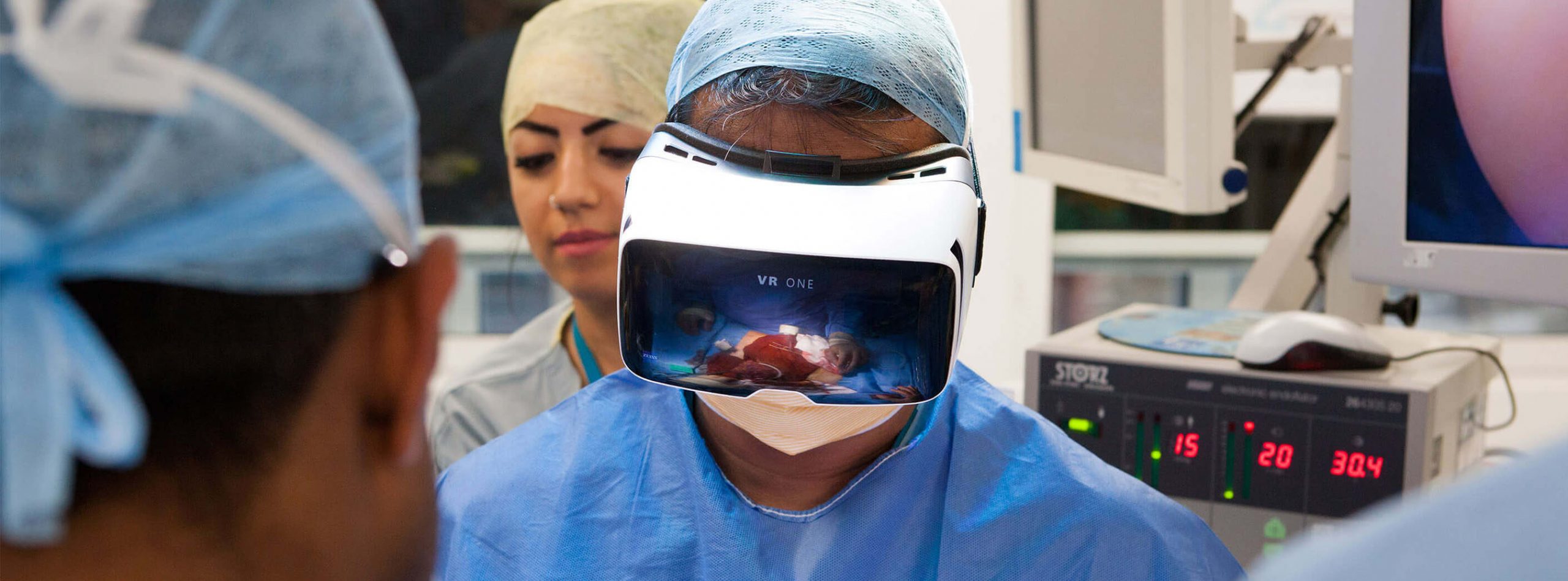 doctor using VR headset to operate